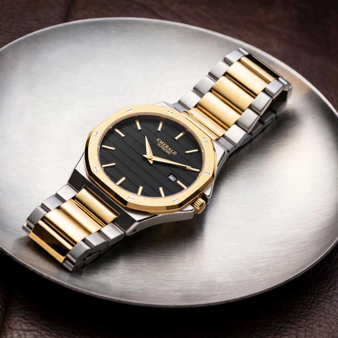 Emerald Supreme two tone watch dial close up black striped texture gold markers date