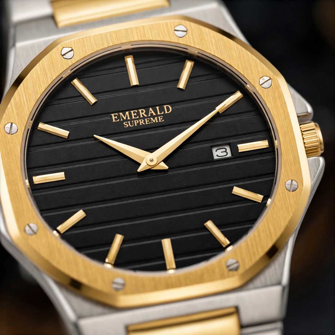 Emerald Supreme two tone watch dial close up black striped texture gold markers date